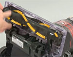 Periodically clean the brushroll.